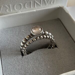 Two Pandora beads rings, one with clear stone